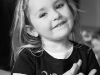 Big Sister Chloe pakying with Playdough