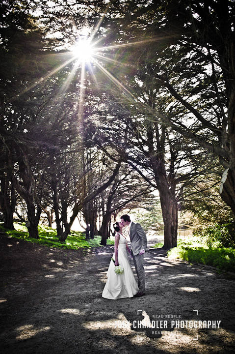 Newlyweds kissing at Sutro Heights - San Francisco Wedding Photography