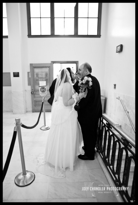 Bride and Groom waiting in line Waiting in the Hallway - San Francisco City Hall Wedding Photography