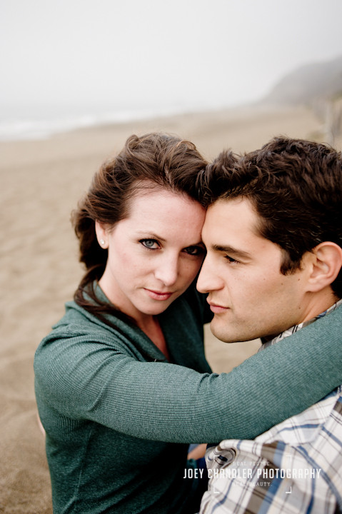 Couple hugging in the Sand at San Francisco's Baker Beach