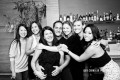 Group of friends hugging a woman at her Birthday Party in San Francisco