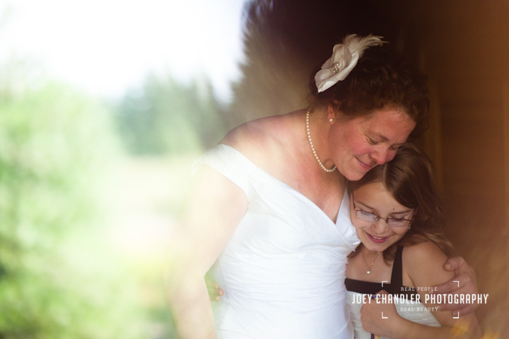 Bride hugging her flower girl San Francisco Wedding Photographer