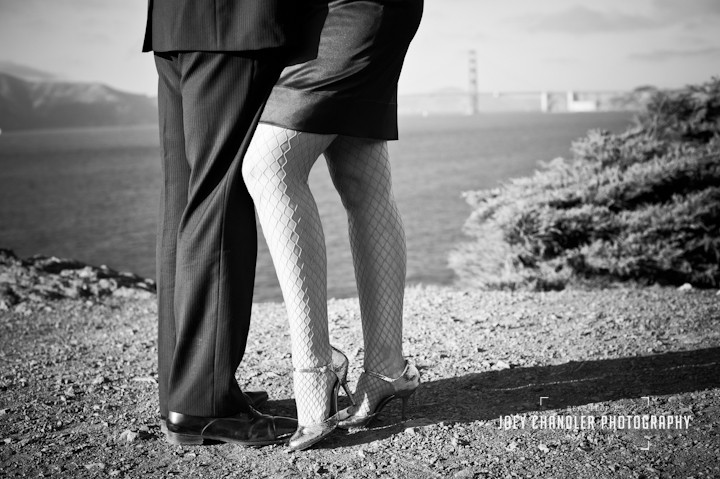Couple tangoing with the Golden Gate Bridge in the distance.
