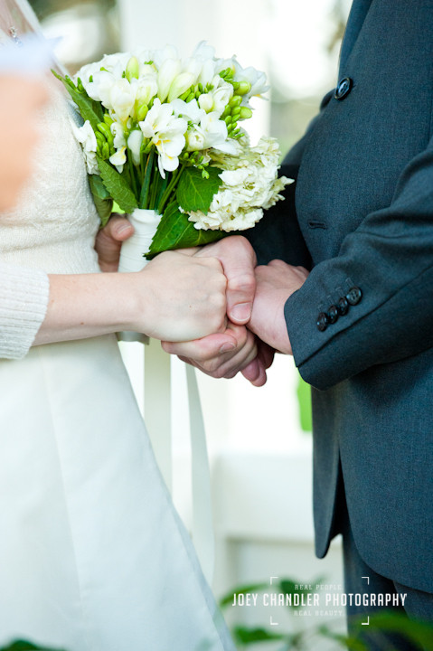 Bride and Groom Holding Hands at a wedding in Sutro heights Park in San Francisco