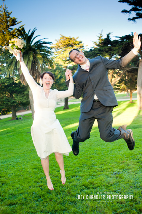 Bride and Groom Jumping for Joy at a Sutro Heights Park Wedding in San Francisco