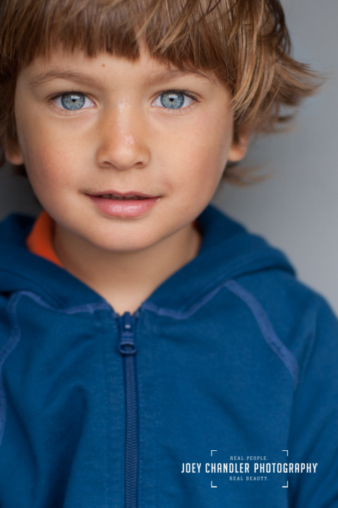 Young boy with striking blue eyes at San Francisco's Baker Beach