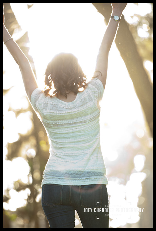 So Happy!! Photograph of a woman jumping for joy in San Francisco's Presidio