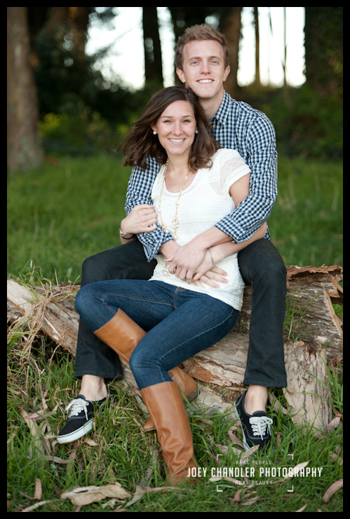 Have to love the boots Photograph of an engaged couple sitting together in San Francisco's Presidio