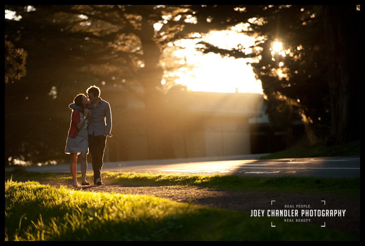 Photograph of couple kissing and walking in beautiful golden light in the Presidio