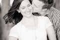 Man kissing his fiance's neck in the Presidio - San Francisco Photographer Joey Chandler