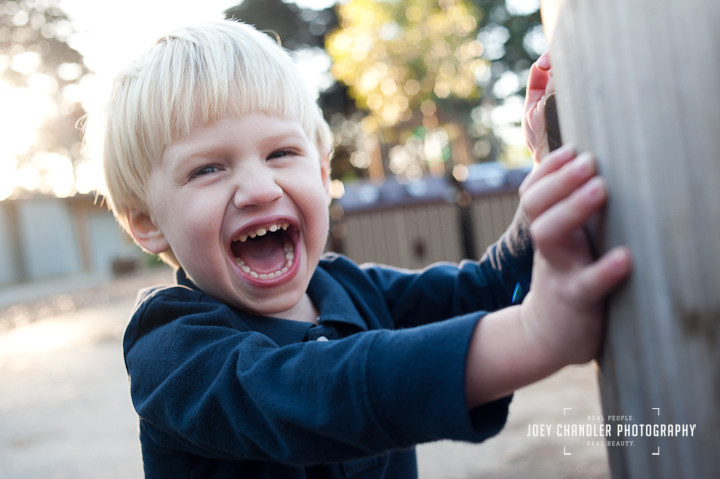Boy laughing at Robhill in the Presidio - San Francisco Photographer Joey Chandler