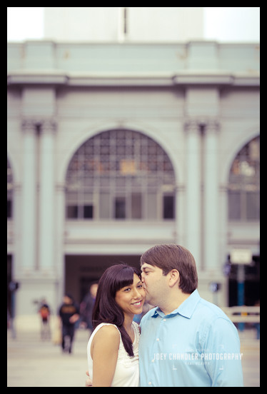 Tender Moment at the Ferry Building Couple kissing at the San Francisco Ferry Building - San Francisco Engagement Photographer Joey Chandler