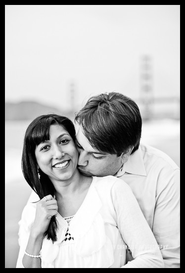 Sweet Nothings at Baker Beach Man kissing woman's neck at Baker Beach - San Francisco Engagement Photographer Joey Chandler