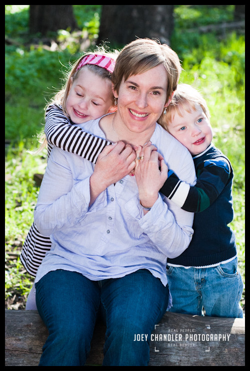 A beautiful hug in a beautiful San Francisco morning A mother hugging her two children in San Francisco's Presidio