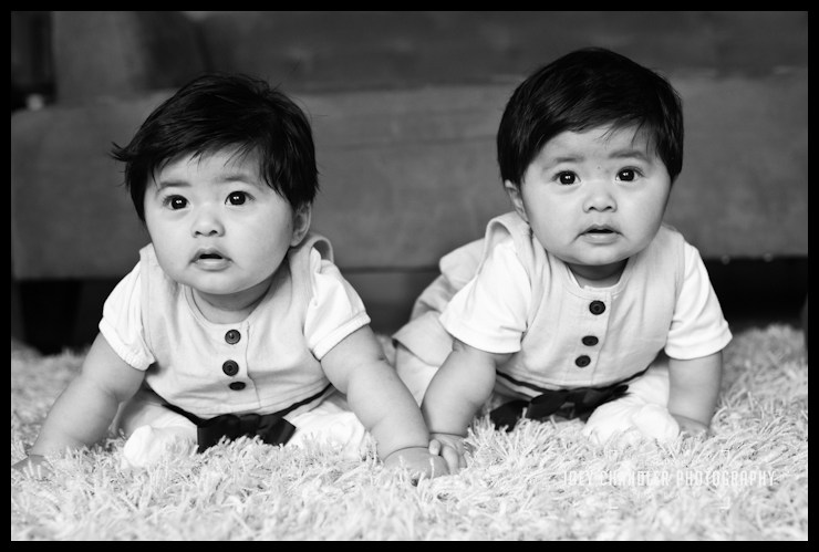 Twin Sisters Baby twin sisters on a rug - San Francisco Child Photography