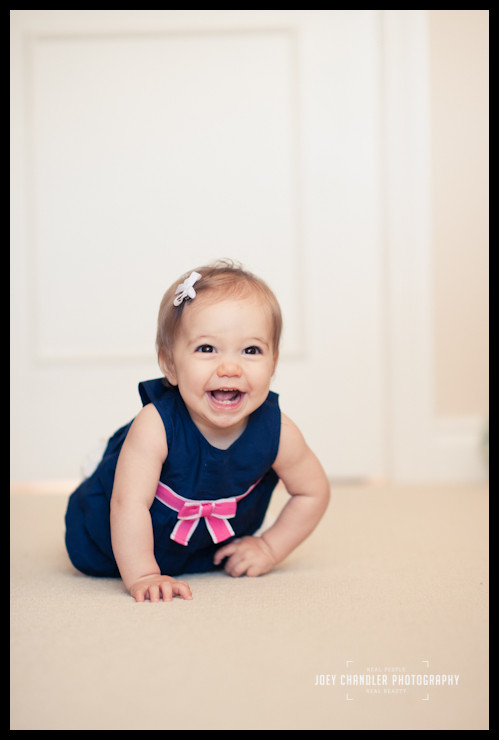 Baby girl crawling in bedroom Baby girl crawling in bedroom