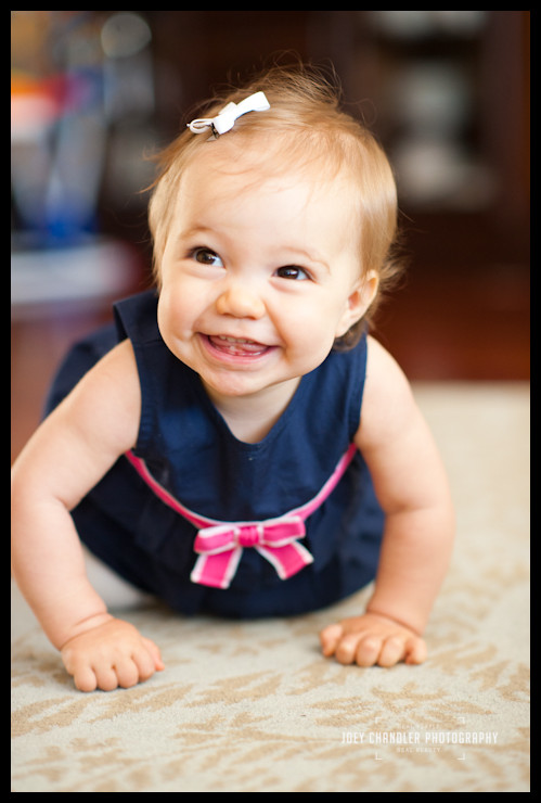 Baby girl smiling for San Francisco Family Photographs Baby girl smiling and crawling in San Francisco Home