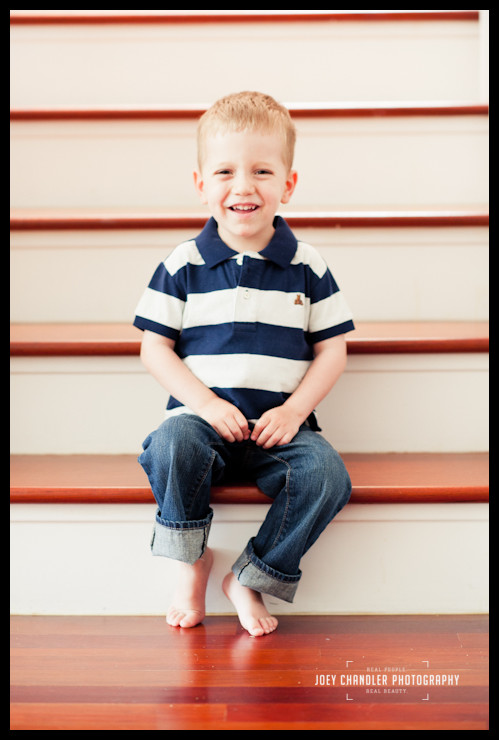 Boy sitting on stairs in San Francisco Home Boy sitting on stairs in San Francisco Home