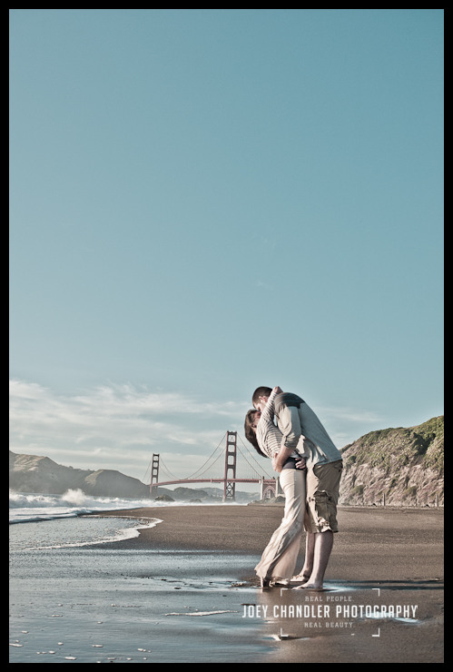 Engaged couple kissing at San Francisco's Baker Beach Engaged couple kissing at San Francisco's Baker Beach