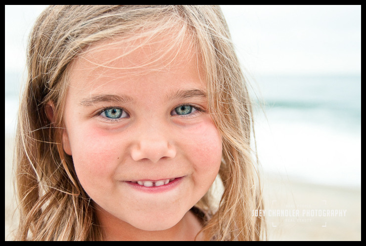 Girl smiling for Seagirt Beach Family Photographs Girl smiling on the beach at Seagirt for Family Photographs