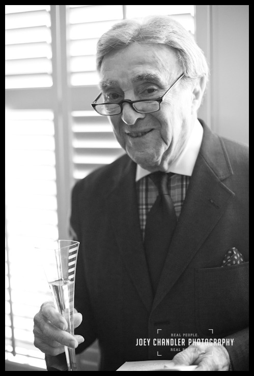 Great great grandfather smiling at San Francisco Naming Ceremony Great great grandfather smiling with champagne glass