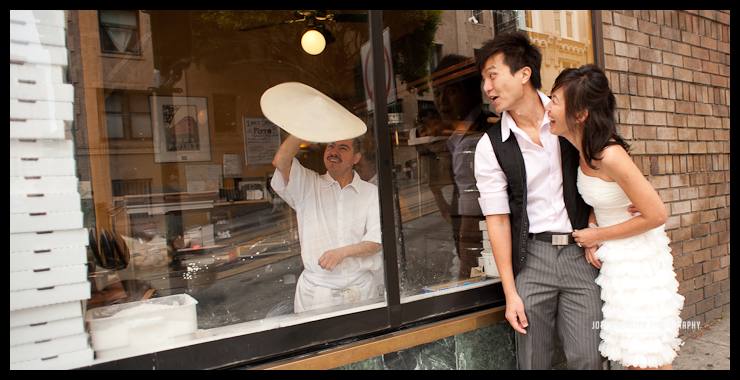 A San Francisco engagement pizza with all the works Engaged couple watching San Francisco chef throw pizza dough.