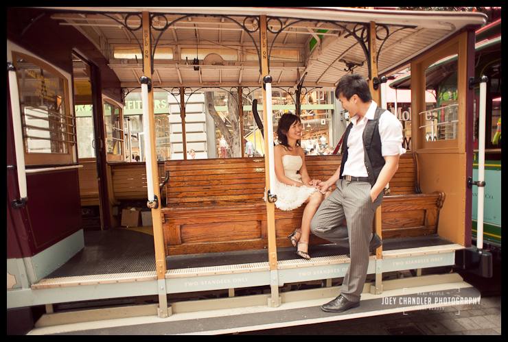 chilling in a San Francisco Cable Car An engaged couple sitting in a San Francisco Cable Car