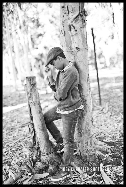Thoughtful boy posing in the woods at Perry Farms